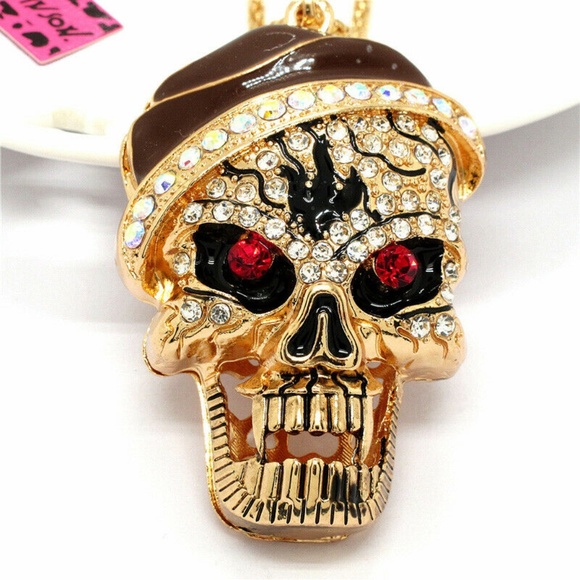 Jewelry - Crystal Skull Necklace Red Eyes with brown beanie
